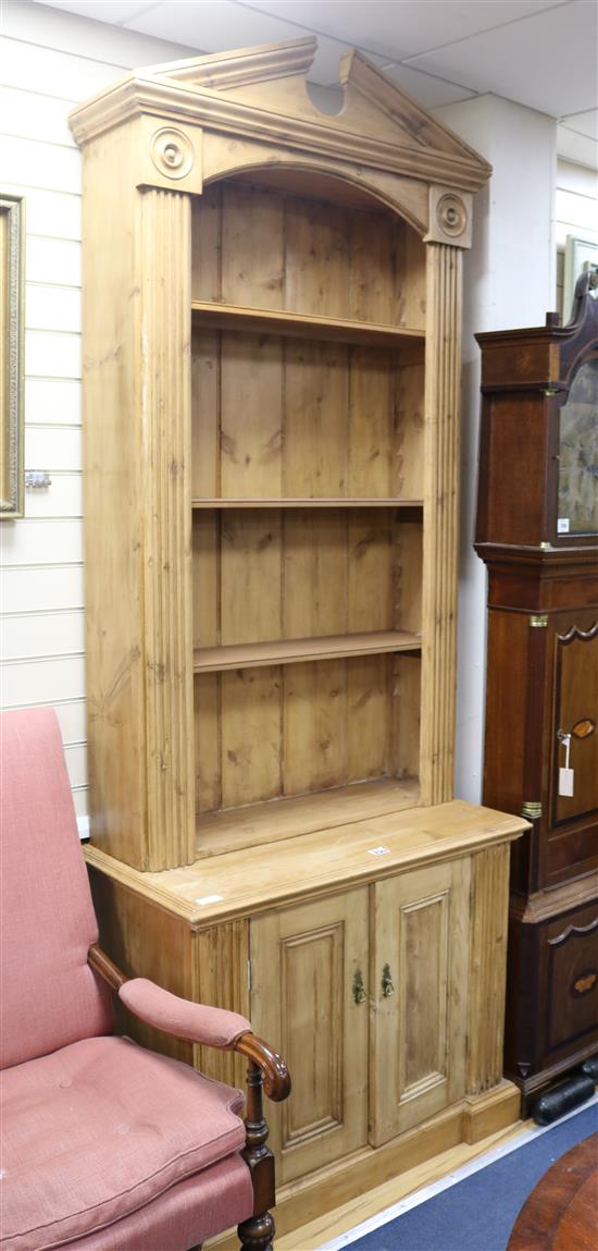 A near pair of classical style pine open bookcases, W.3ft 2.5in. D.1ft 10in. H.8ft 7in.